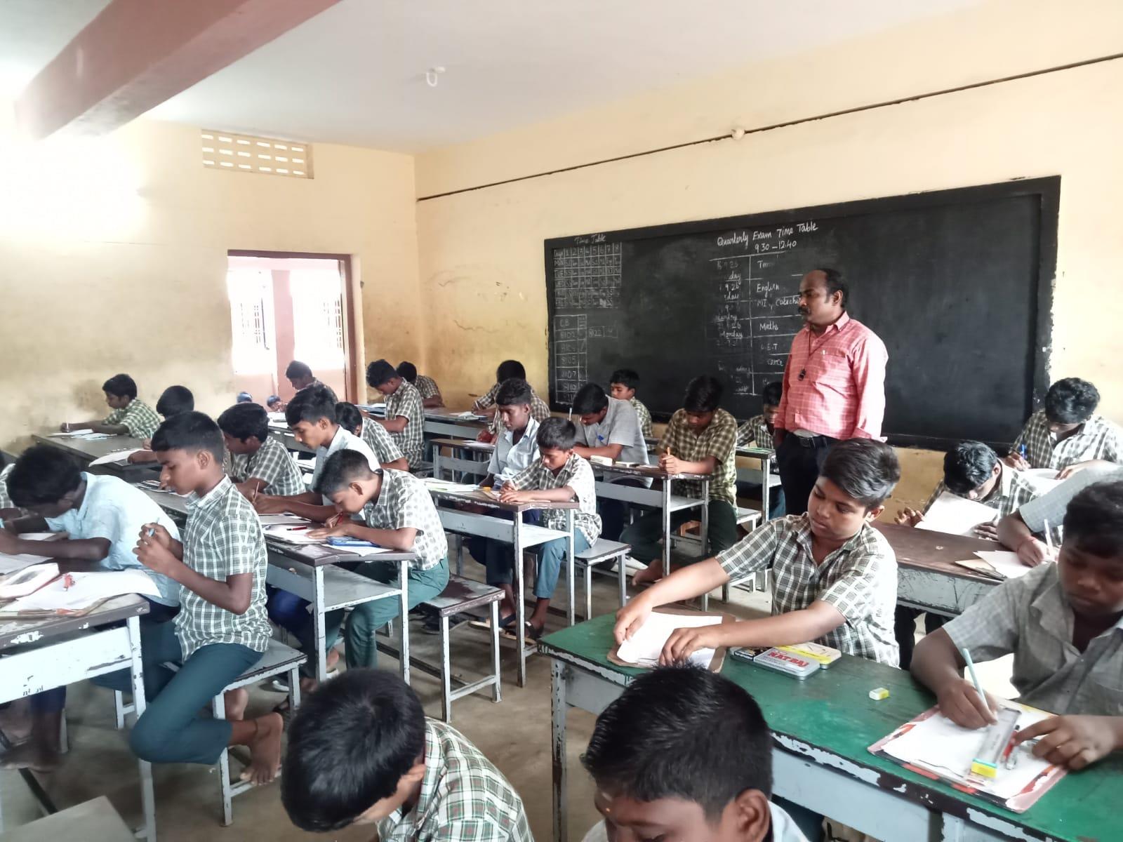 A bright classroom with desks and a board